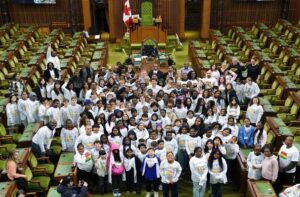 A group of children in the legislative assembly.