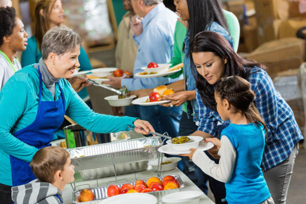 Volunteers serving breakfast